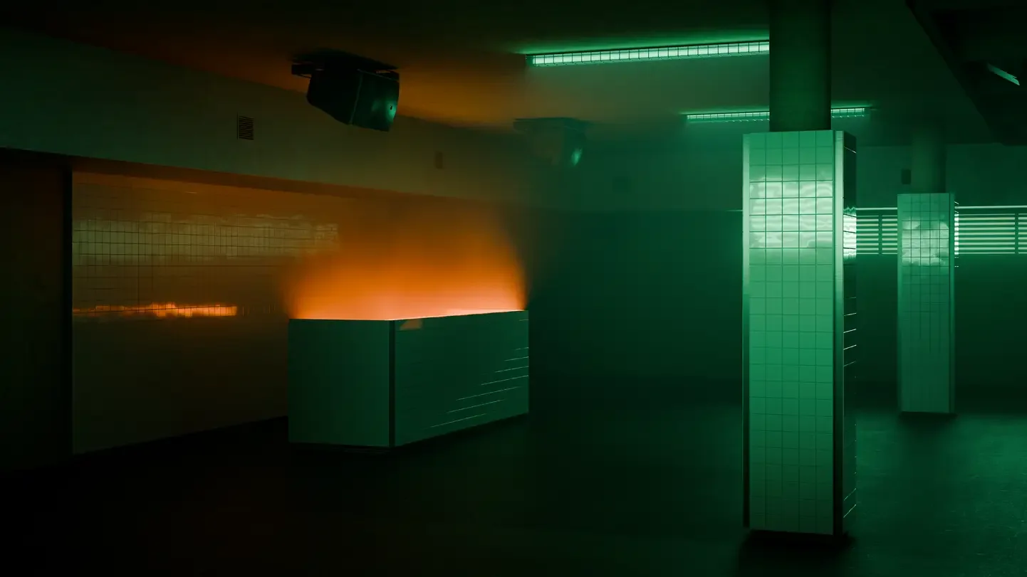 Essaim’s tiled DJ booth and green-lit dance floor