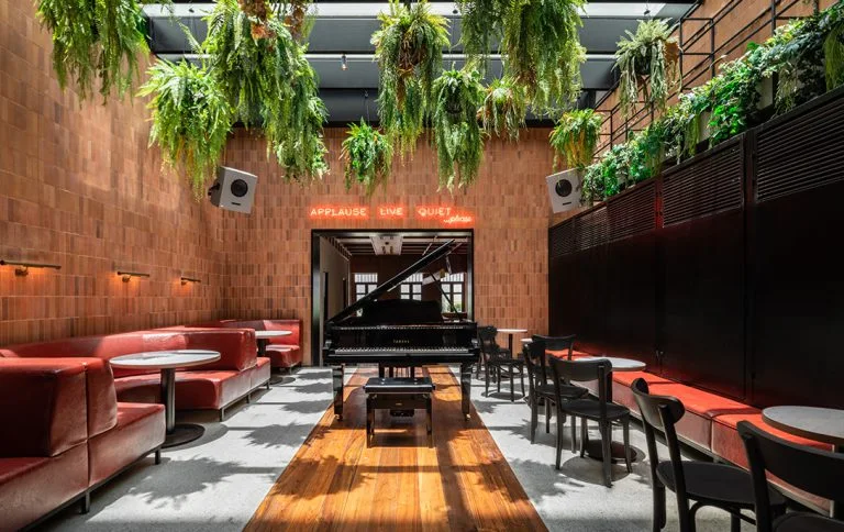 The bar and its seating area at SIWILAI Sound Club