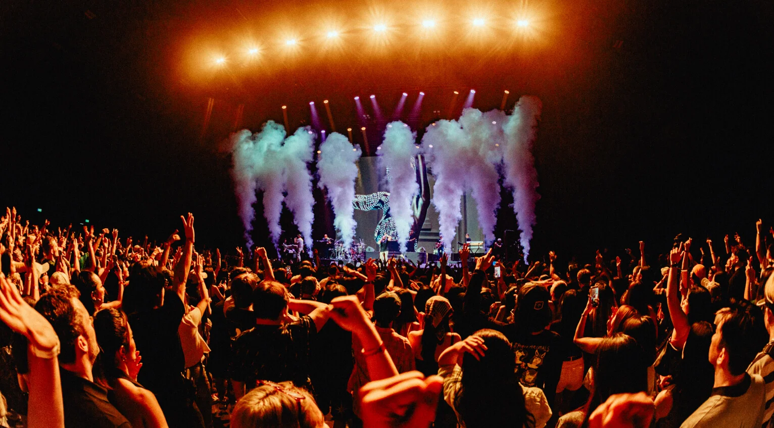 UOB LIVE: an audience facing the illuminated stage, shown on its official website