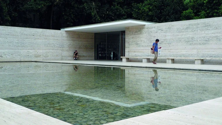 The pavilion's travertine walls beside its reflecting pool at Mies van der Rohe Pavilion