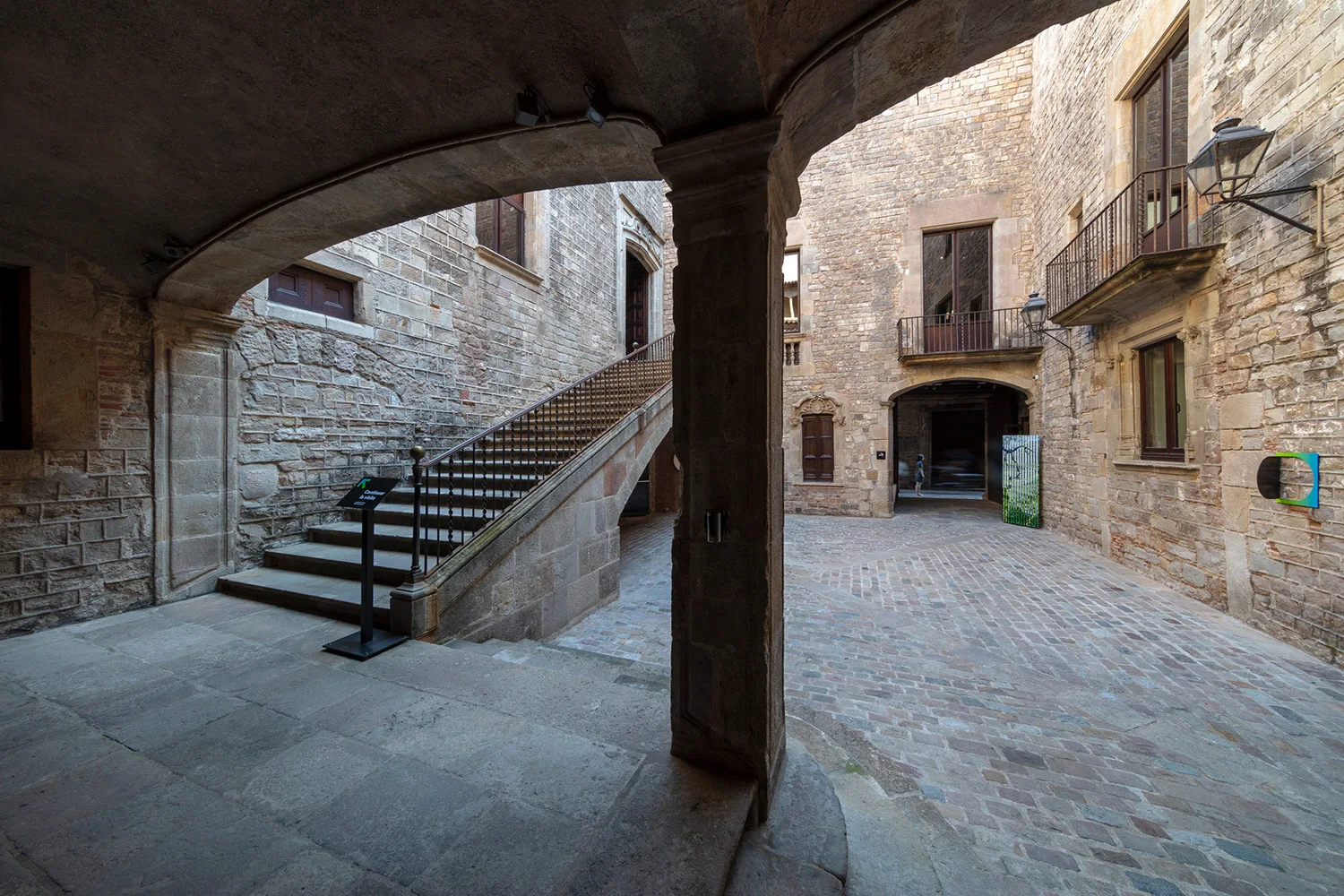 Stone arches and steps in the museum courtyard at Museu de Cultures del Món, Montcada