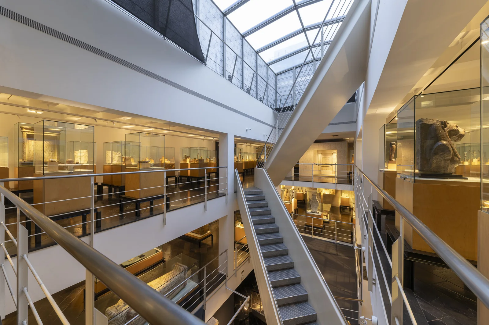 The museum atrium, stairs and display galleries at Museu Egipci de Barcelona