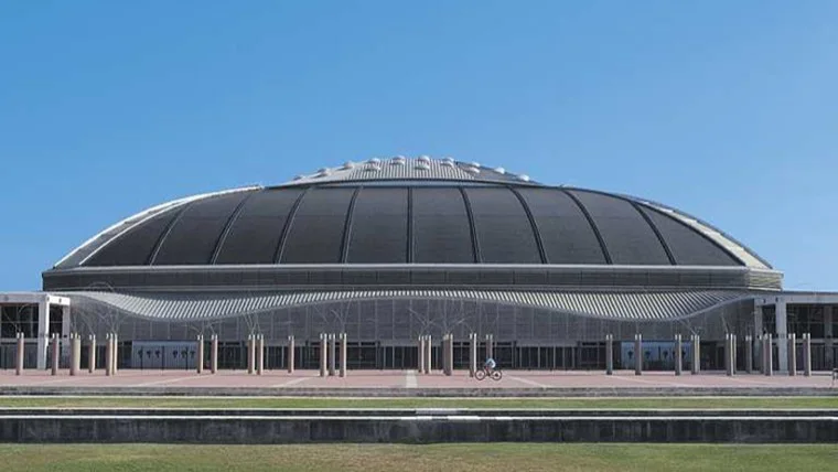 The arena's rounded roof and surrounding forecourt at Palau Sant Jordi