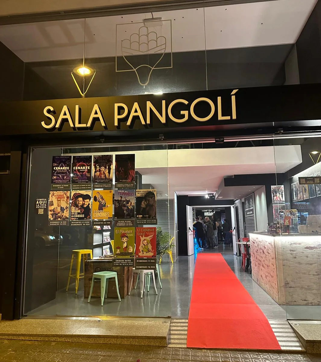 Sala Pangolí: the theatre entrance beneath its illuminated name sign