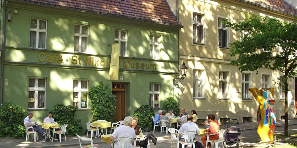 Spandovia Sacra: the historic museum facade and outdoor cafe