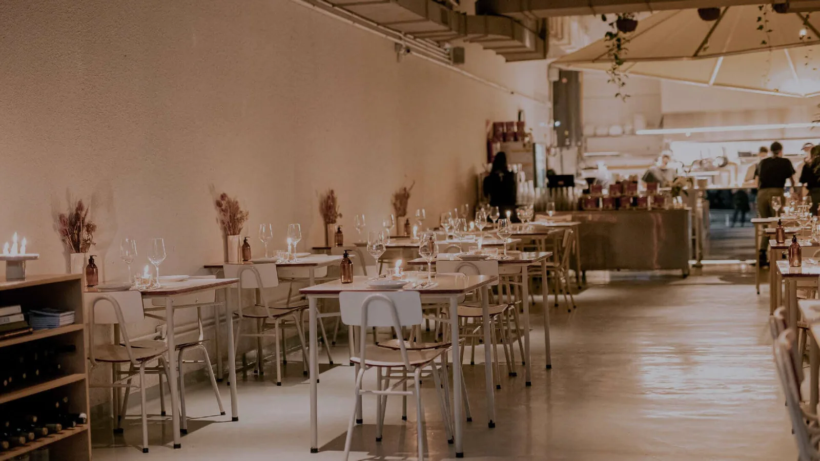 Light-filled dining room with pale wooden chairs at ANAFE