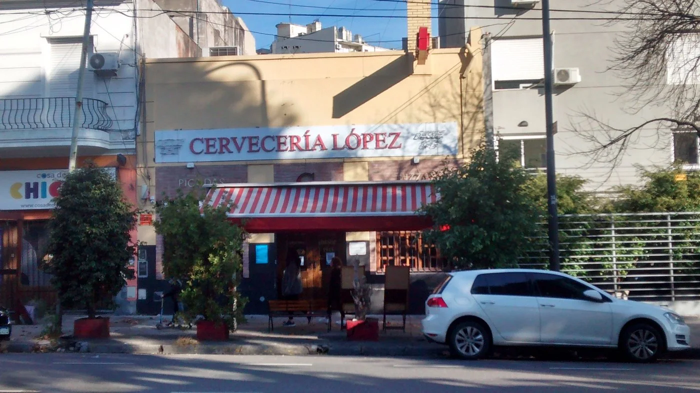Cervecería López: the brewery facade with its striped awning