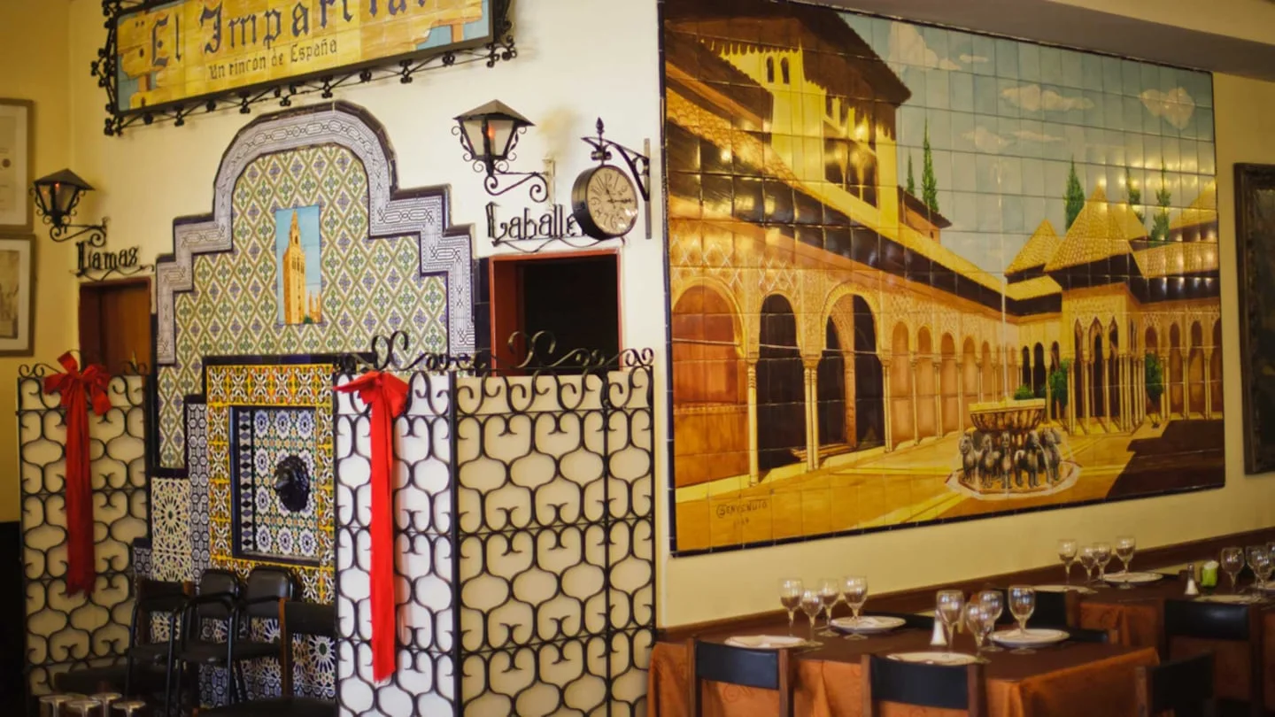 El Imparcial: traditional tiled walls and painted scenes in the historic restaurant