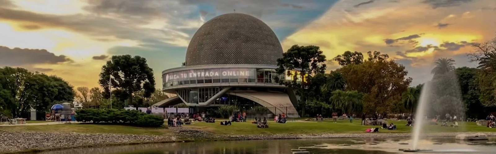 The planetarium dome and fountain at sunset at Planetario Galileo Galilei