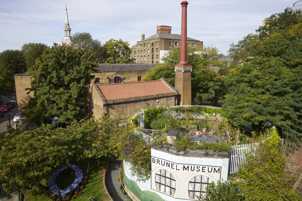 An aerial view of the museum building and grounds at Brunel Museum