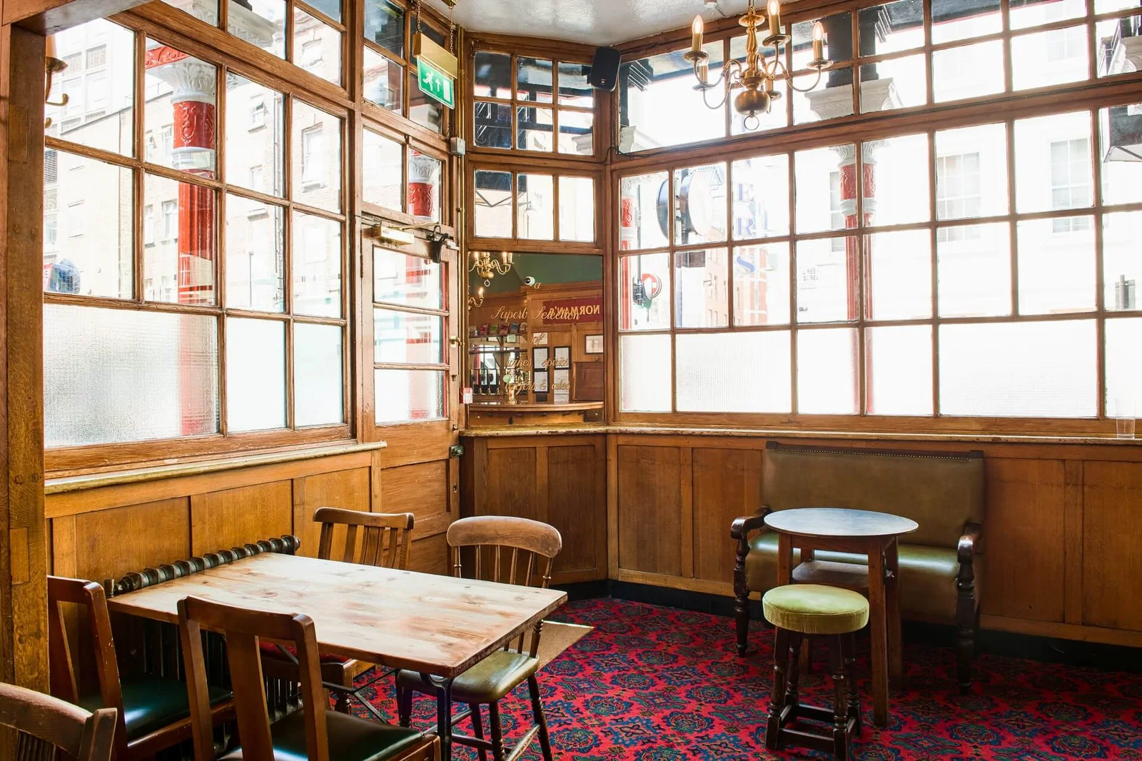 The bar and its seating area at Coach and Horses, Soho
