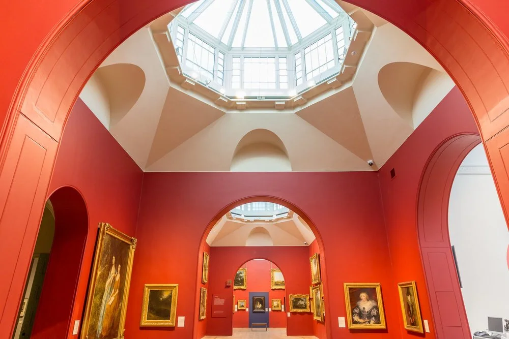 Dulwich Picture Gallery: red-walled galleries beneath the octagonal skylight