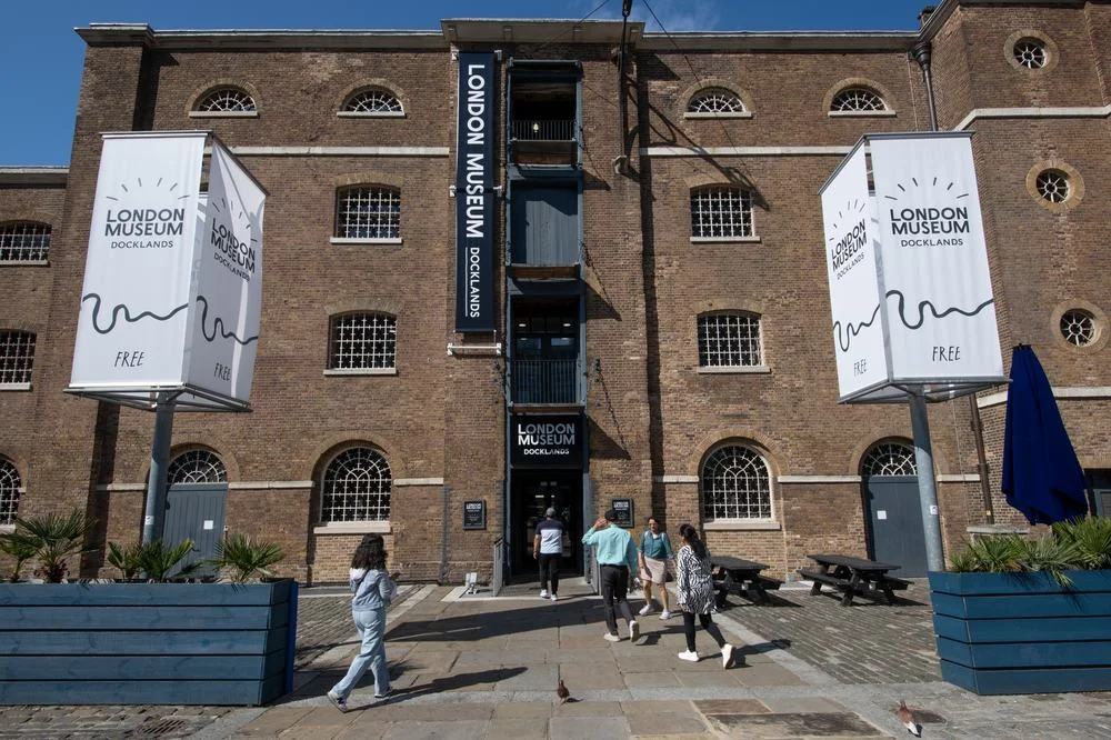 The brick facade and museum entrance at London Museum Docklands