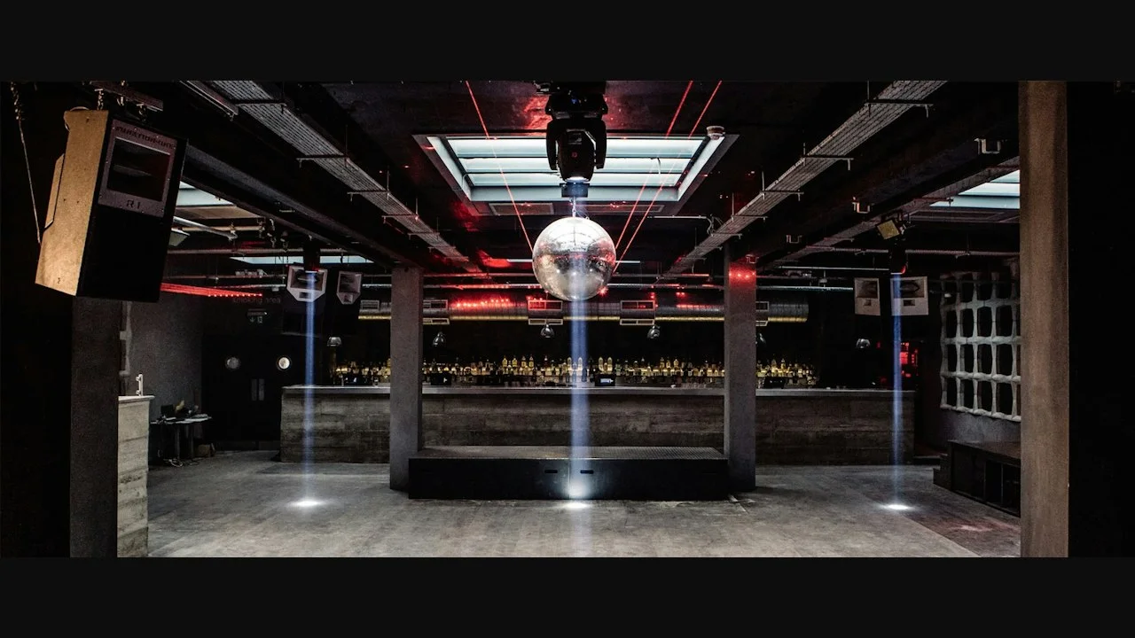 Phonox: a mirror ball above the open dancefloor and dark bar