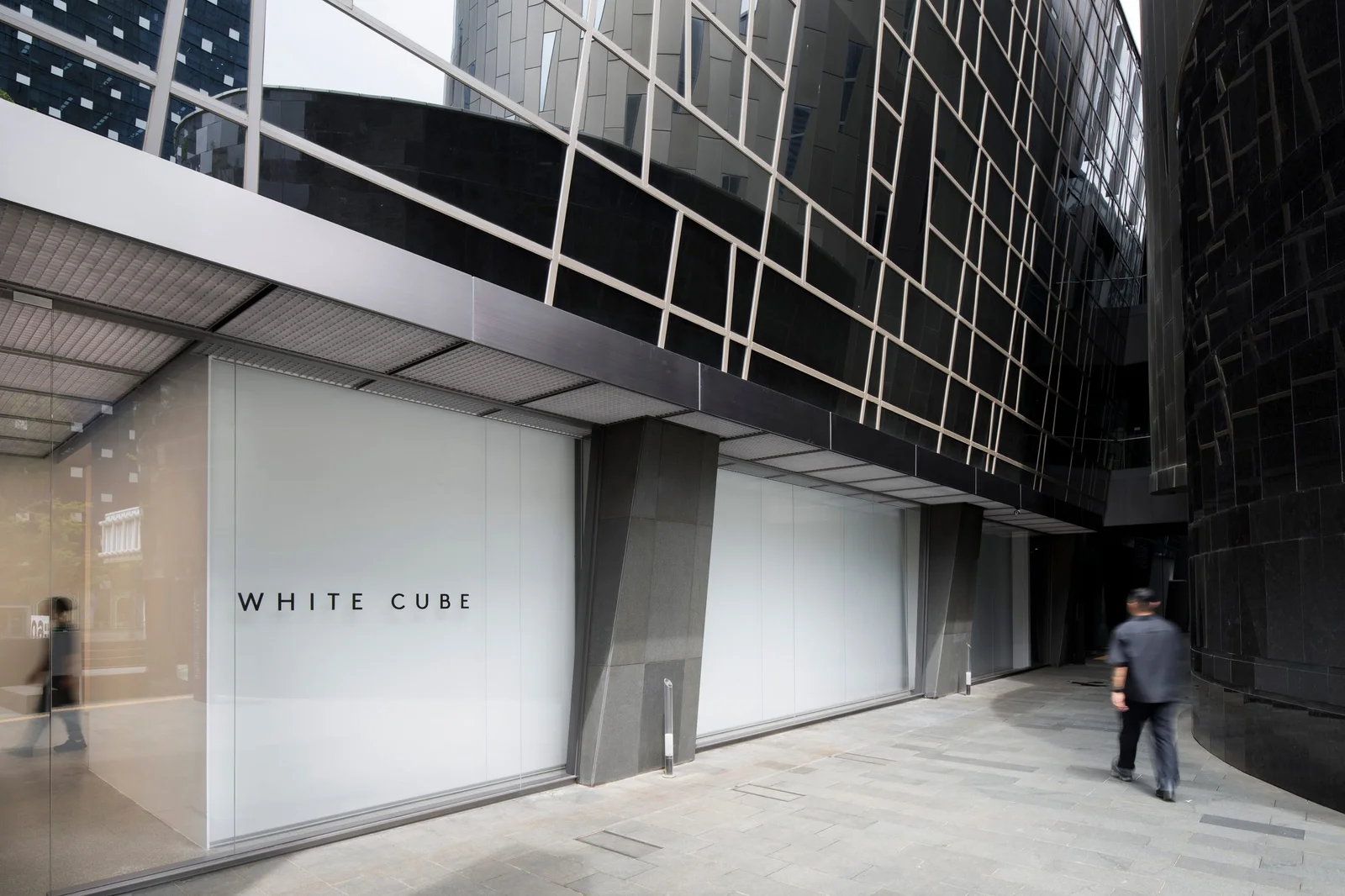 The white gallery entrance beneath a glazed upper facade at White Cube Mason’s Yard