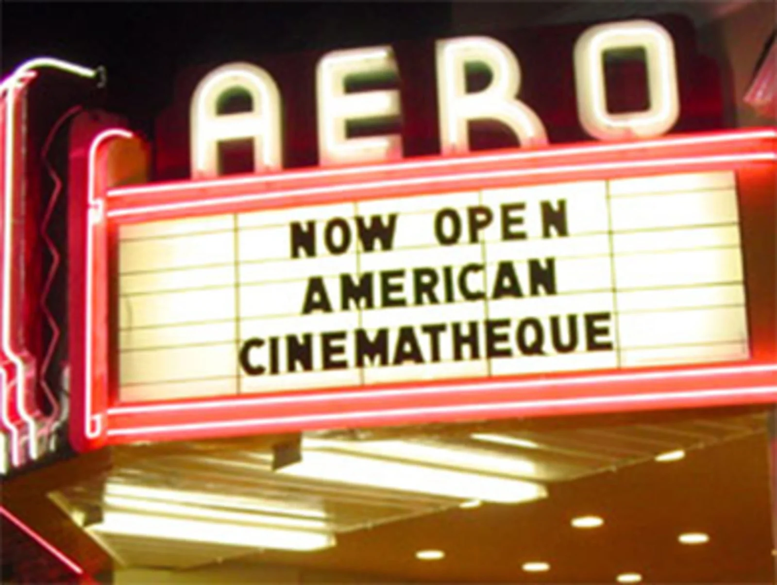 The illuminated cinema marquee at Aero Theatre