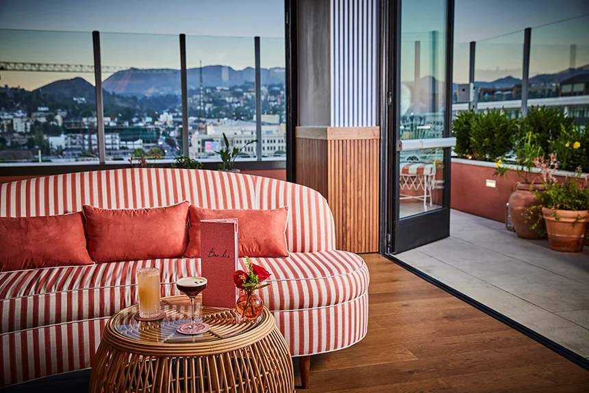 Bar Lis: pink lounge seating beside wide views across Los Angeles