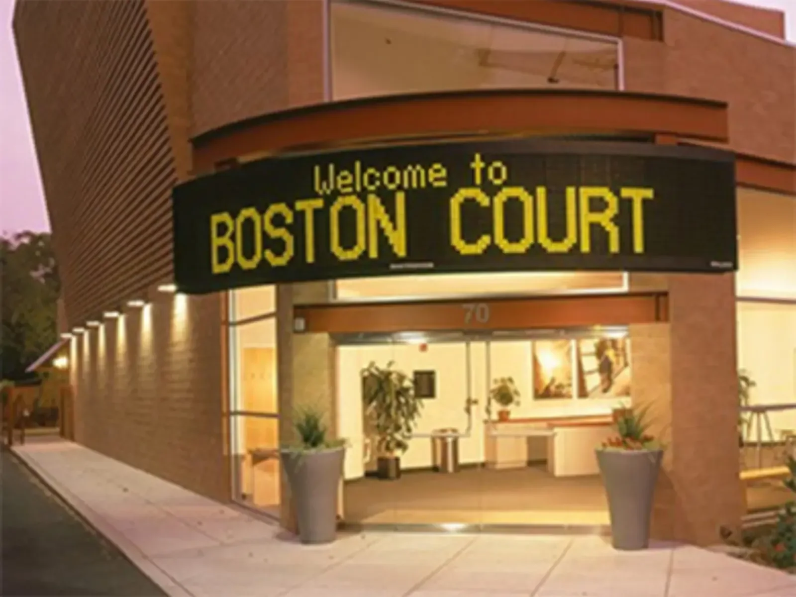 The arts centre entrance illuminated in the evening at Boston Court Pasadena