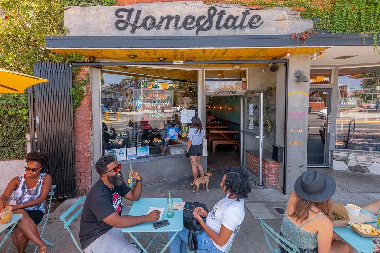 The restaurant shopfront and outdoor tables at HomeState, Hollywood