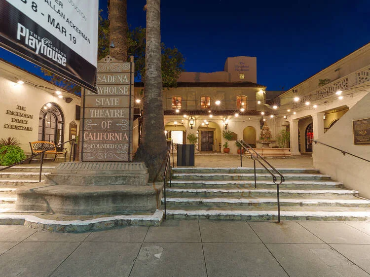 Pasadena Playhouse: the theatre courtyard and entrance lit warmly at blue hour