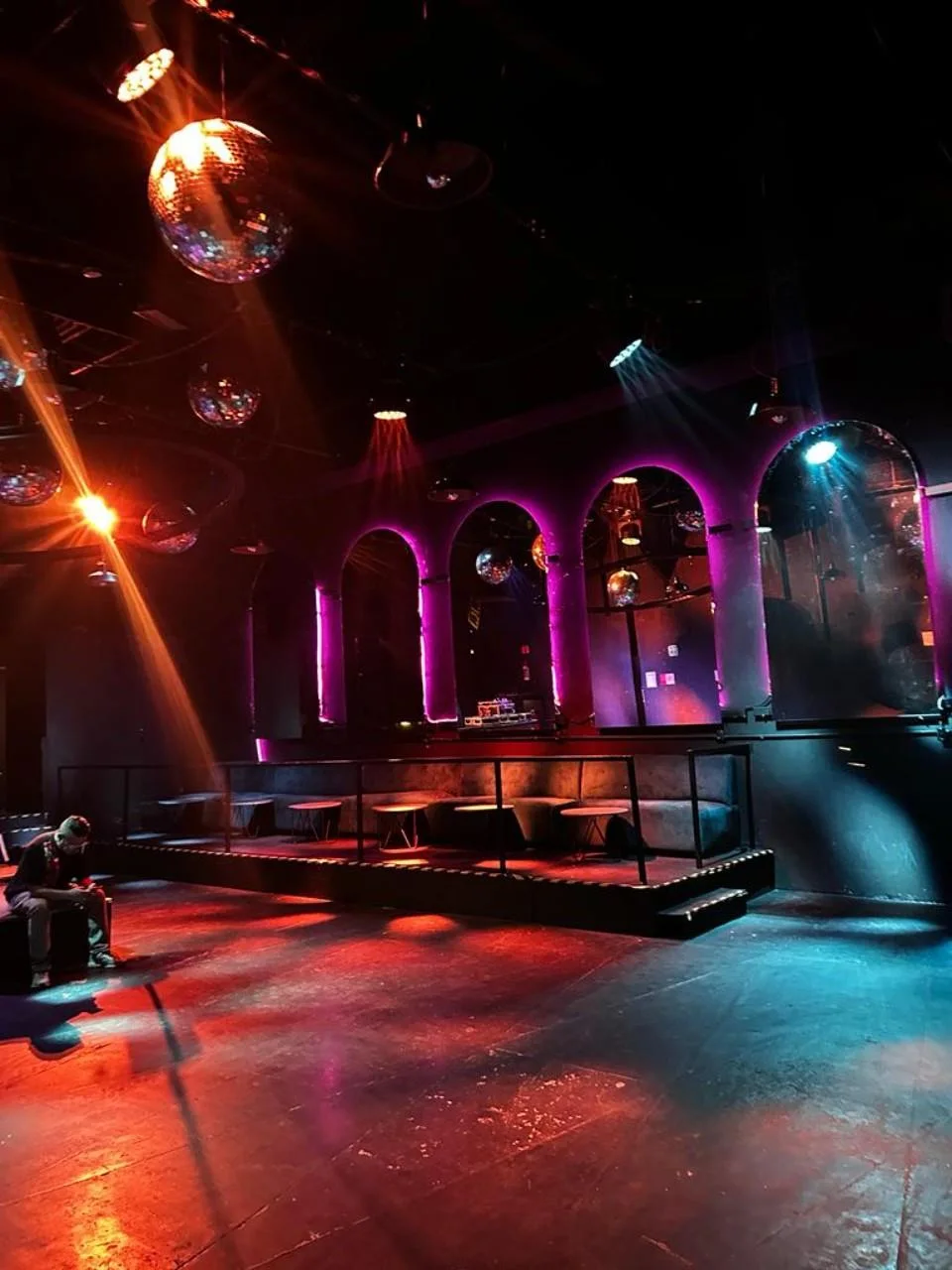 Purple lighting and disco balls in the Burned Room at SIC Community Club, Versalles 64