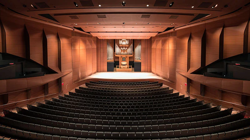 The auditorium, organ and seating viewed from the stage at Alice Tully Hall