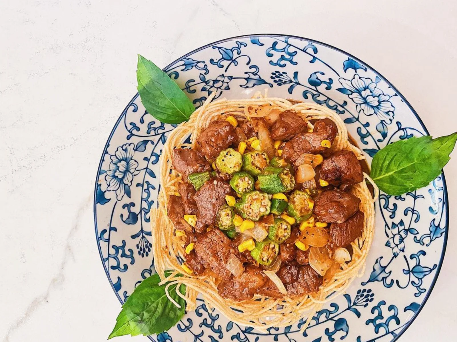 Cha Kee: a colourful plated dish photographed from above, shown on its official website