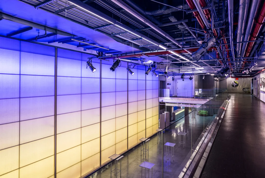 New World Stages: illuminated theatre lobby and mezzanine
