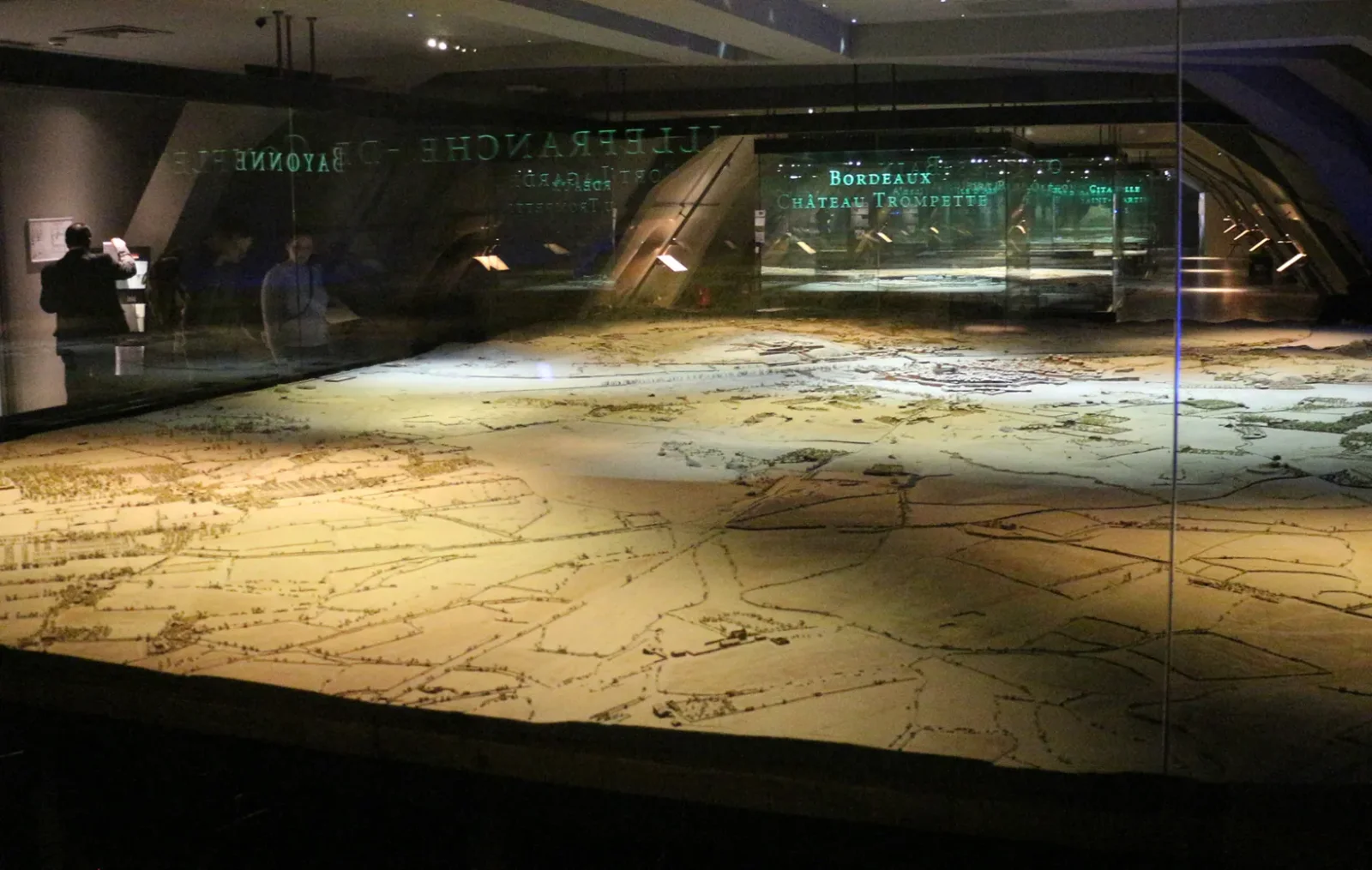 A detailed relief model displayed under glass at Musée des Plans-Reliefs