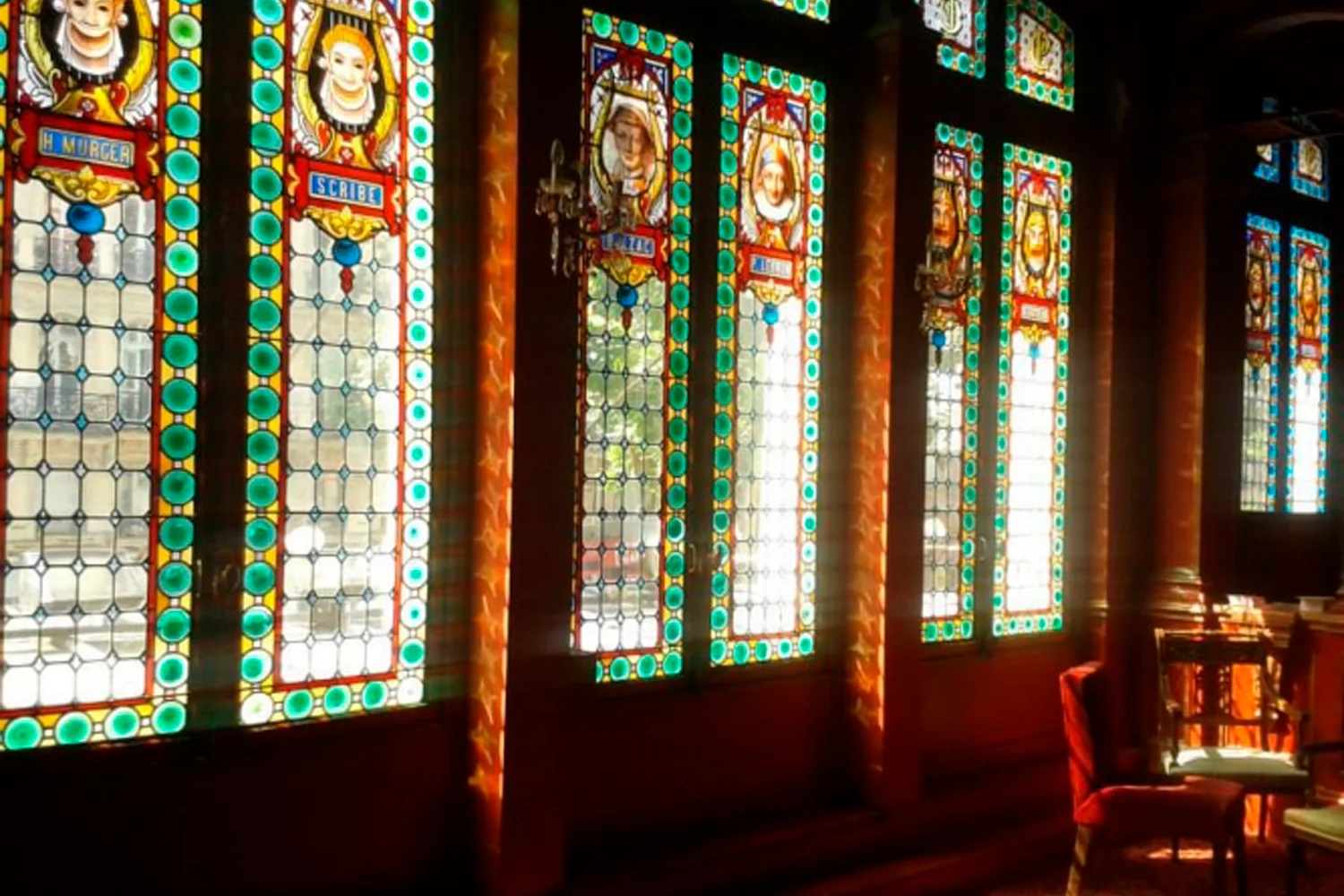 Coloured stained-glass windows in the theatre foyer at Théâtre Antoine