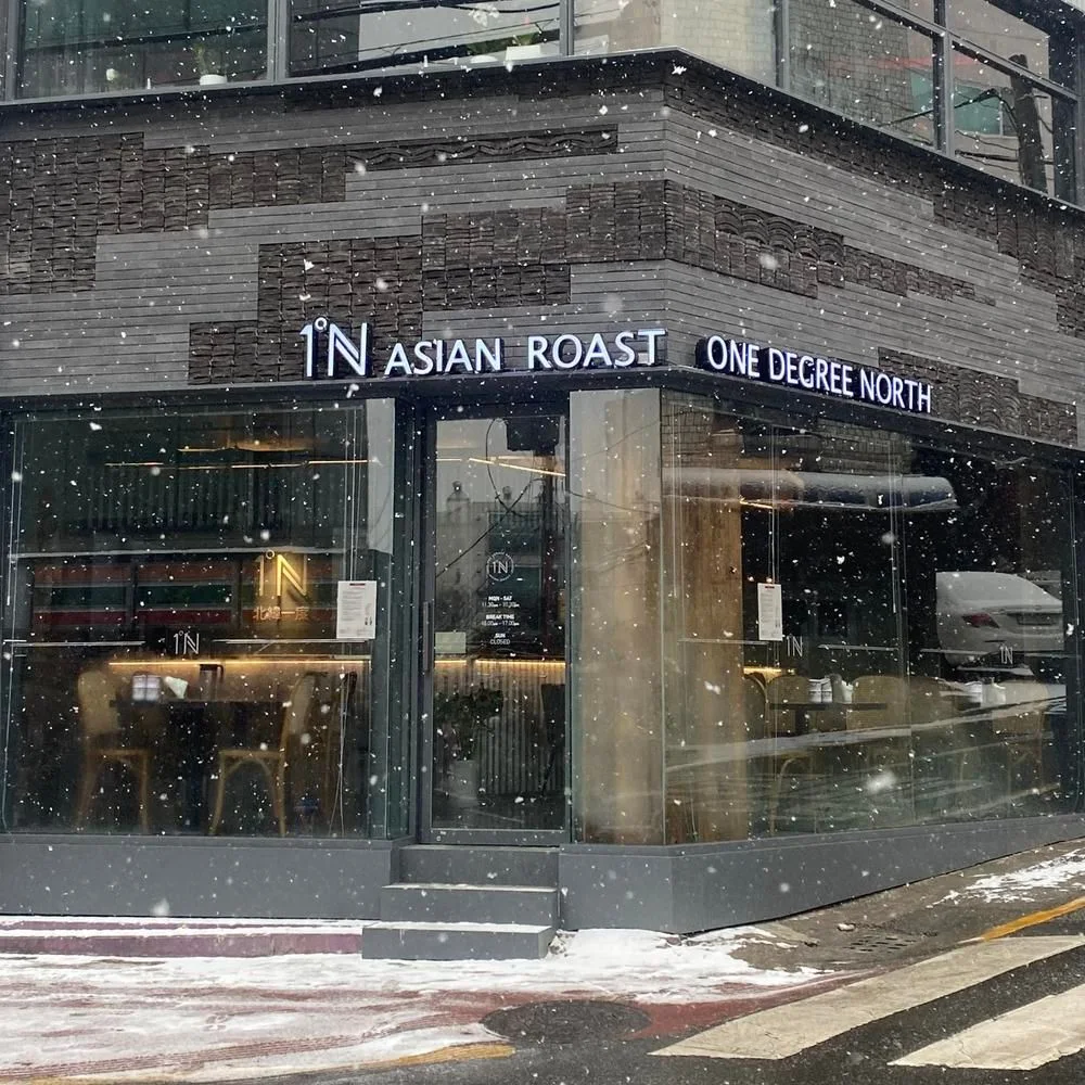 One Degree North: restaurant entrance on a street corner
