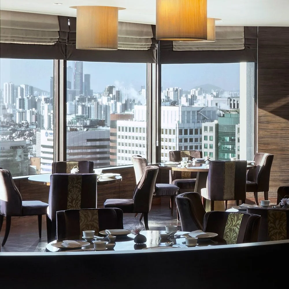 Toh Lim: dining tables with city views