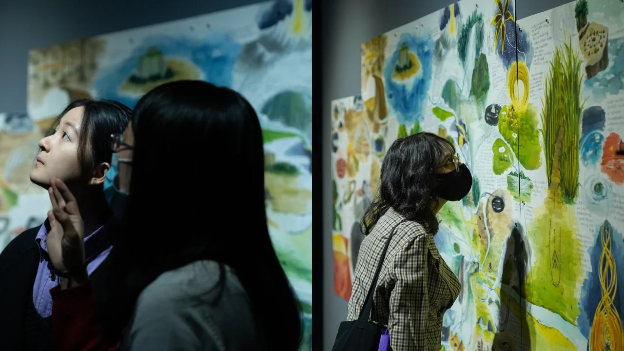 ICA at NYU Shanghai: visitors looking at artworks displayed in the institute's gallery