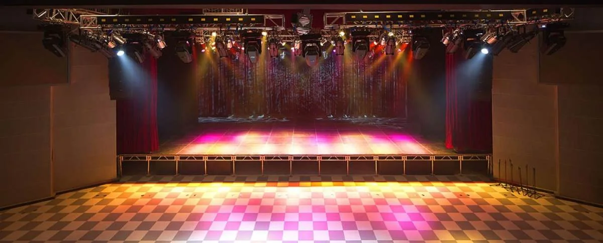 Star Culture Centre: the performance space and stage beneath its lighting rig