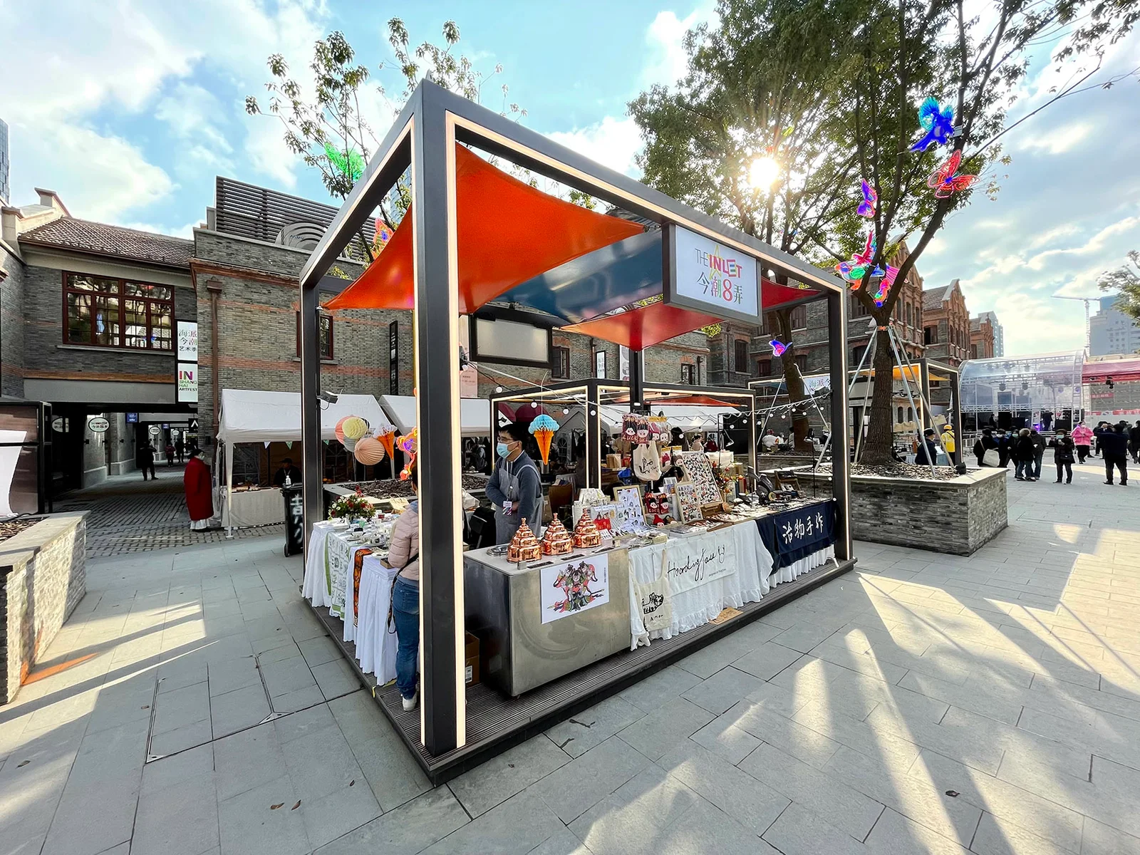 The Inlet: a contemporary market kiosk among restored historic buildings
