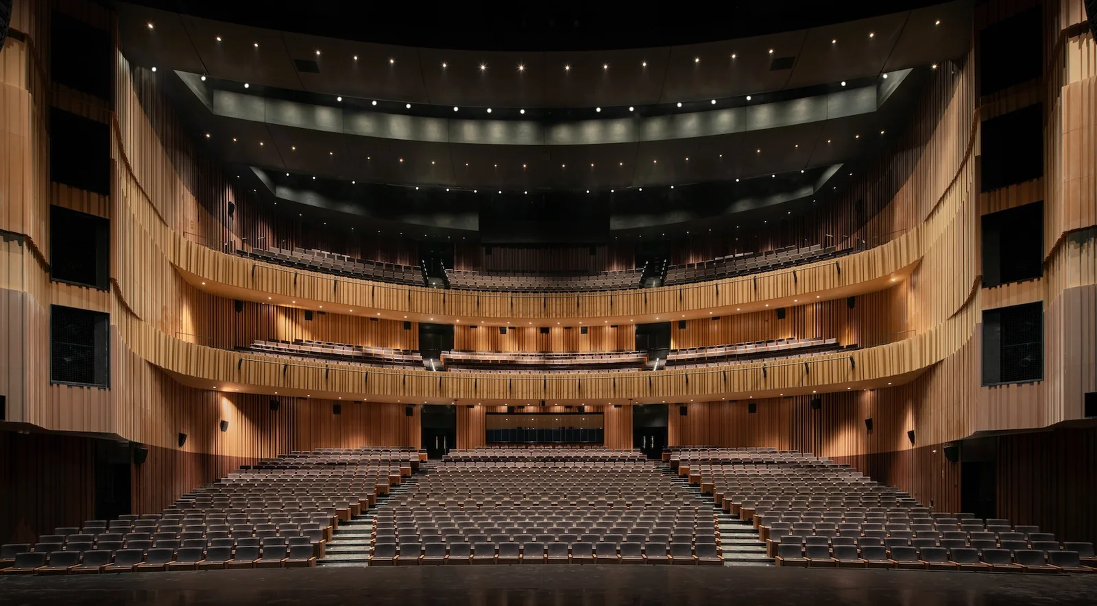 West Bund Theatre: wood-lined balconies above the theatre's rows of seating
