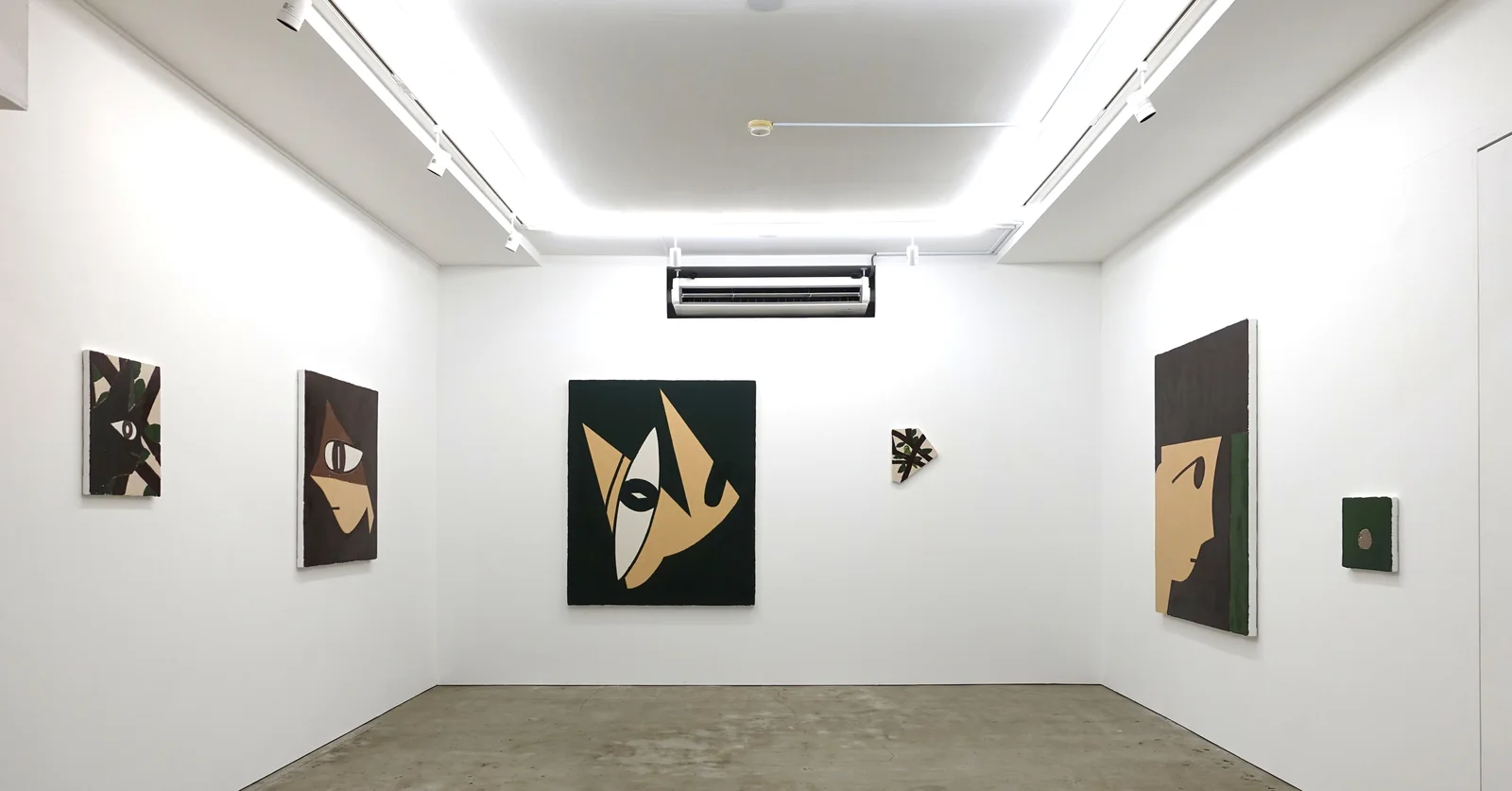 Artdyne: paintings displayed in the bright white gallery
