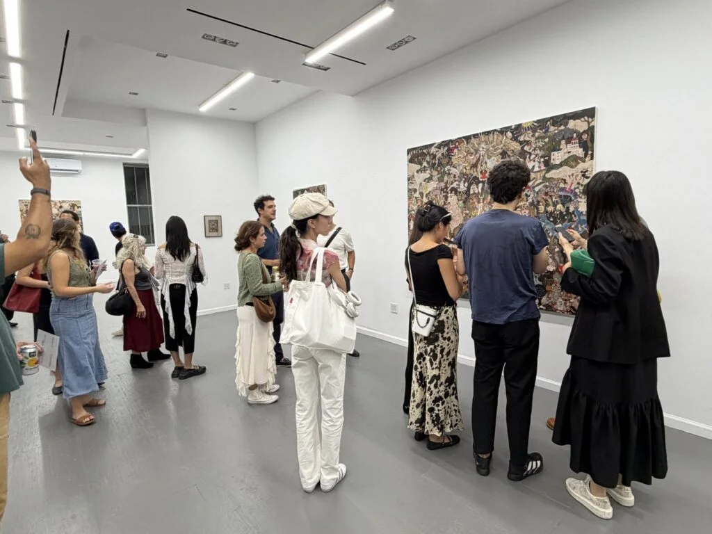 Biscuit Gallery: visitors in the gallery exhibition space