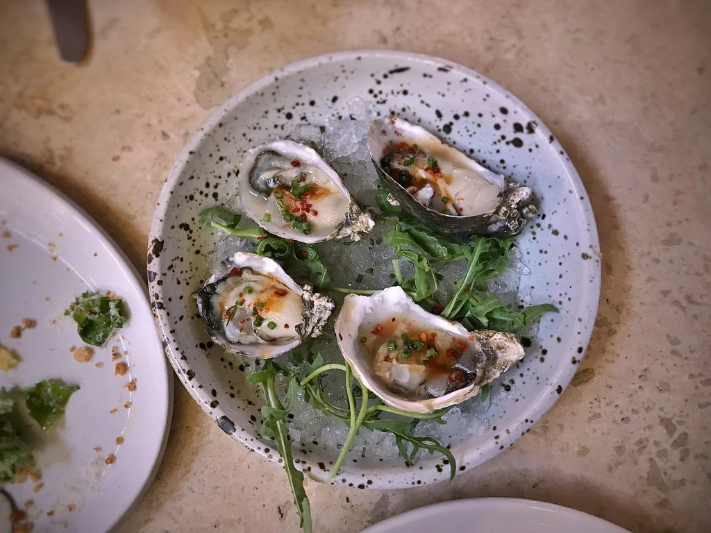 Archival photograph of food at Manuela (2018)